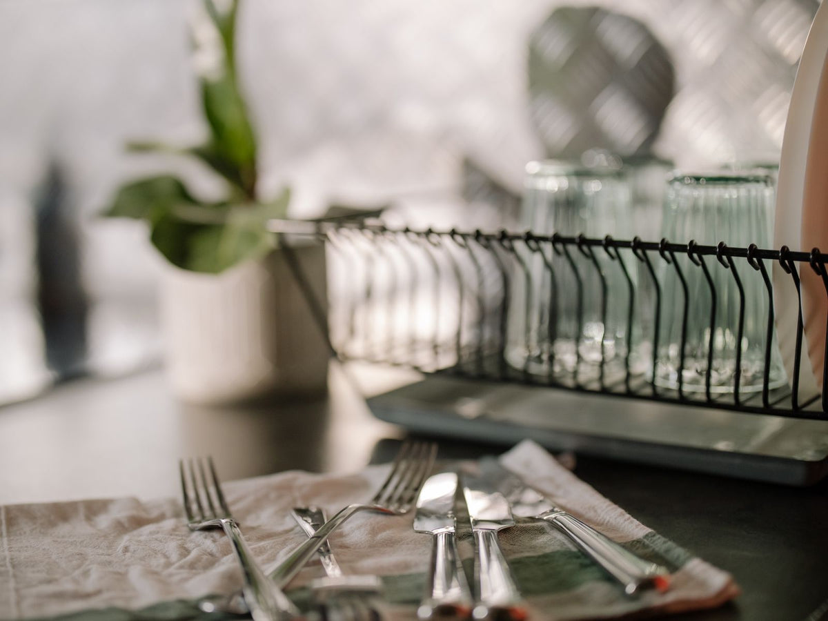 Dish drying rack with cutlery holder and glasses draining