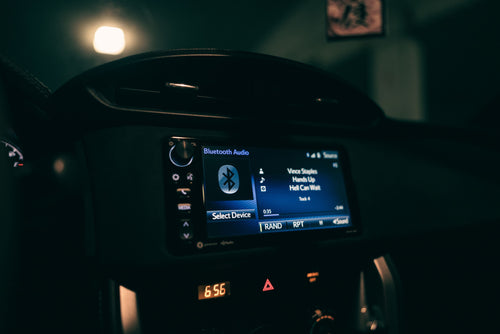 Car dashboard streaming Bluetooth audio at night