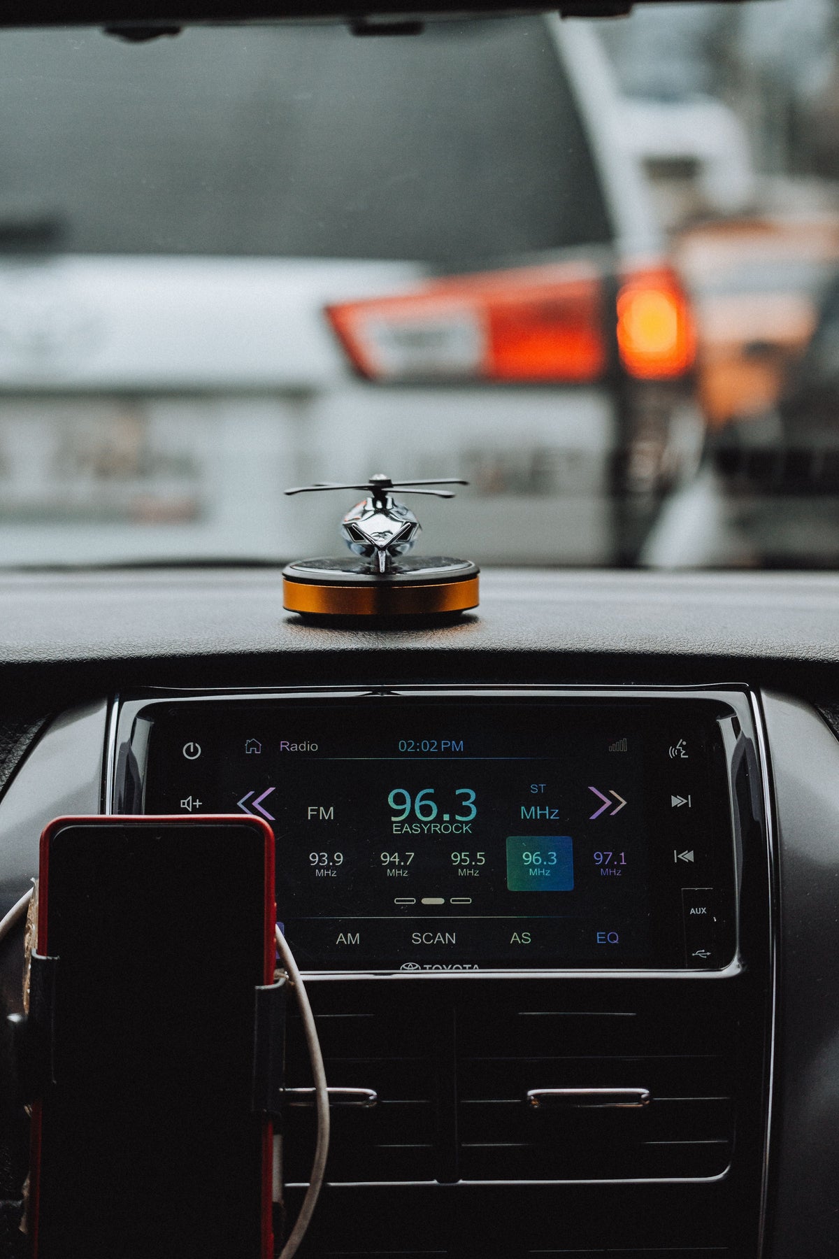 Car FM radio tuner display used with a Bluetooth FM transmitter