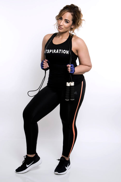 Woman posing with a jump rope