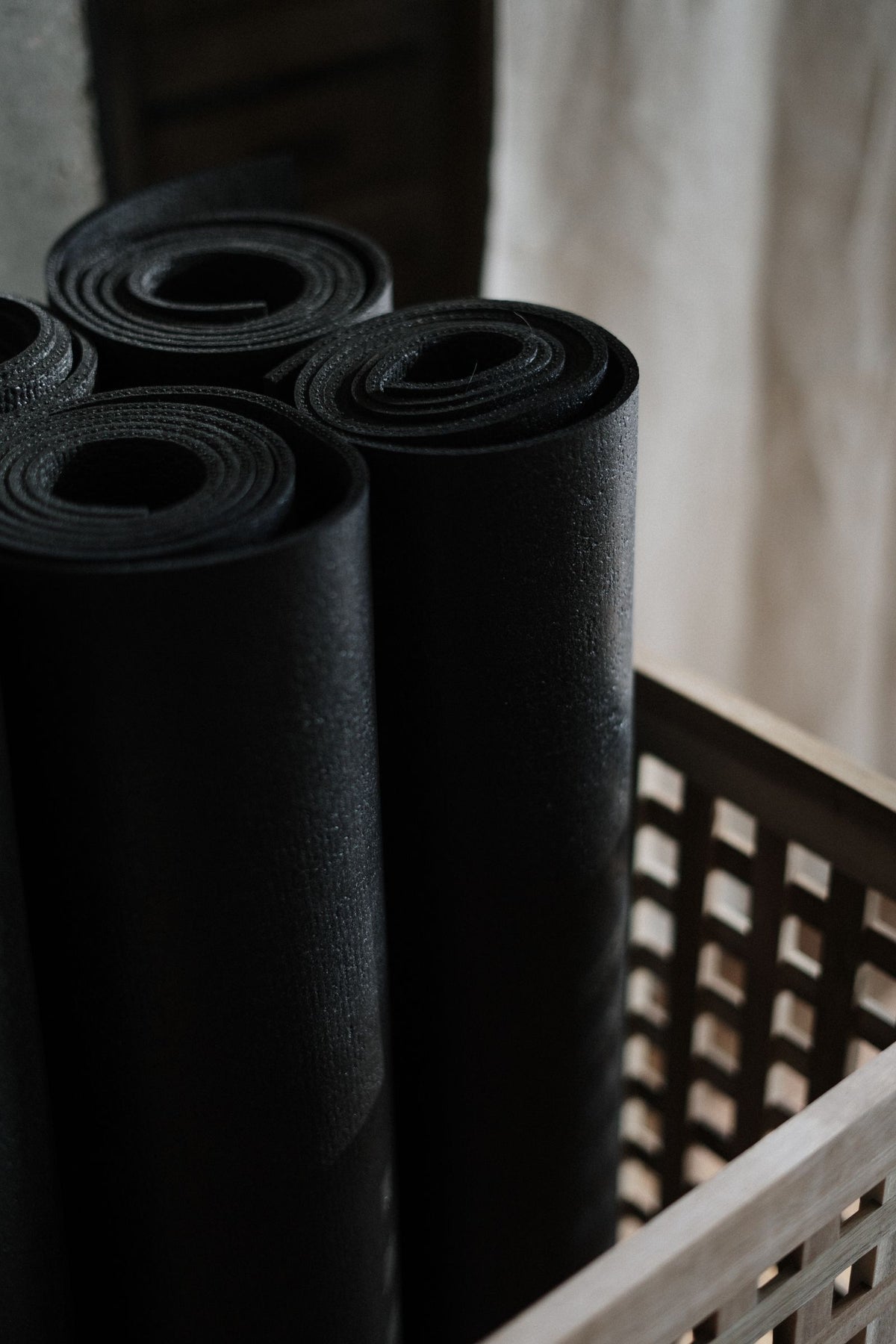Yoga mats rolled and stacked