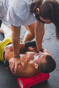 Athlete using a foam roller for recovery