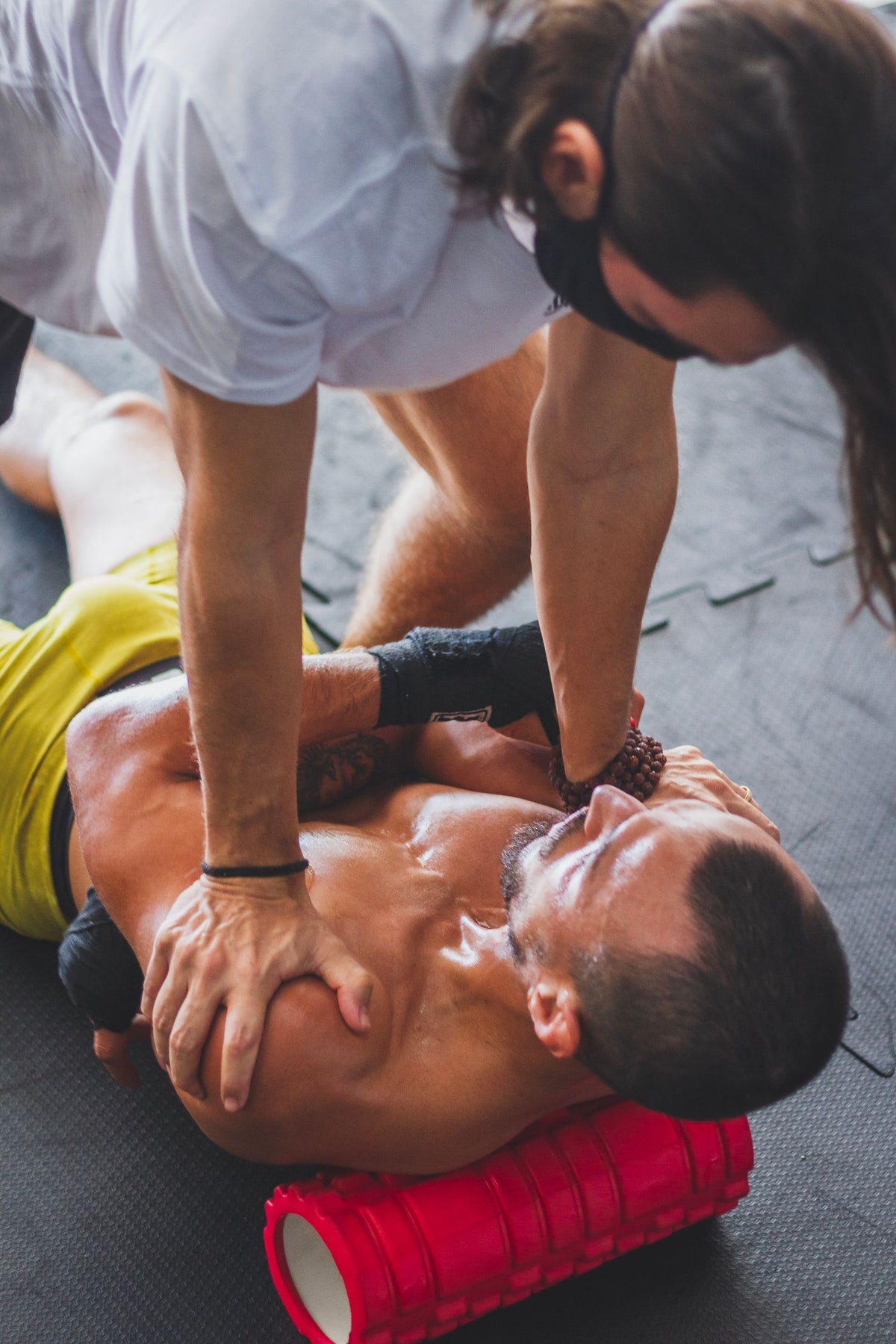 Athlete using a foam roller for recovery