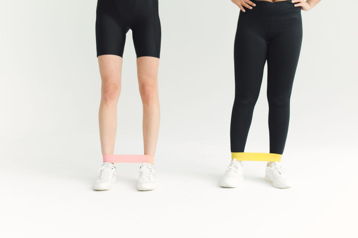 Women using resistance bands during workout