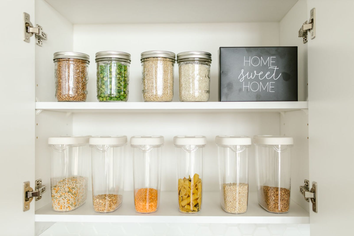 Organized pantry shelf with jars