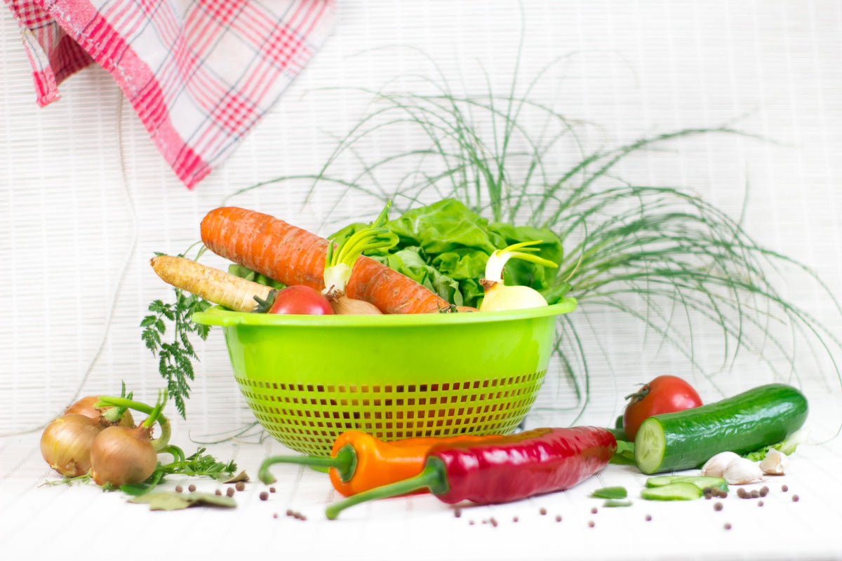 Flexible colander draining freshly washed vegetables